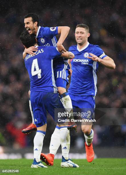 Pedro of Chelsea celebrates scoring his sides second goal with his Chelsea team mates during the Premier League match between Chelsea and Swansea...