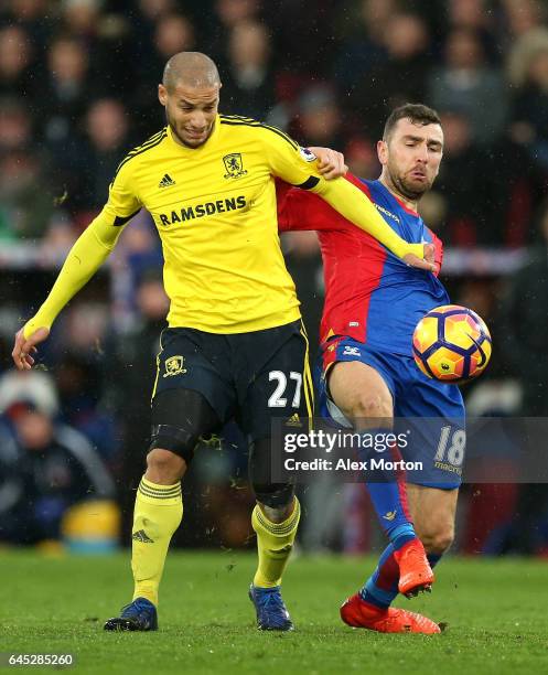 Adlene Guedioura of Middlesbrough and James McArthur of Crystal Palace battle for possession during the Premier League match between Crystal Palace...