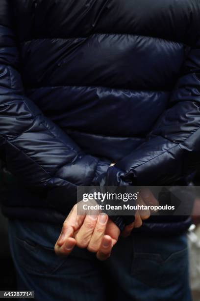 Detailed view of the hands of Dutch Prime Minister, Mark Rutte as he speaks to the media, supporters and the public near Marktplein on February 25,...