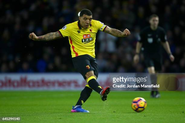 Troy Deeney of Watford scores the first goal from a penalty during the Premier League match between Watford and West Ham United at Vicarage Road on...