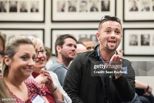 Bill Evans, of North Charleston, South Carolina, voices a concern during a town hall meeting with Sen. Tim Scott , at the Charleston County Council...