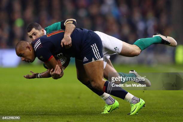 Gael Fickou of France is tackled by Rob Kearney of Ireland during the RBS Six Nations match between Ireland and France at the Aviva Stadium on...