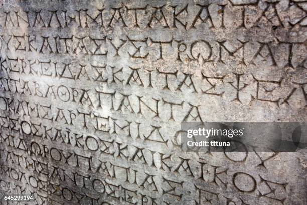 greek lettering in aphrodisias - ancient roman alphabet stock pictures, royalty-free photos & images