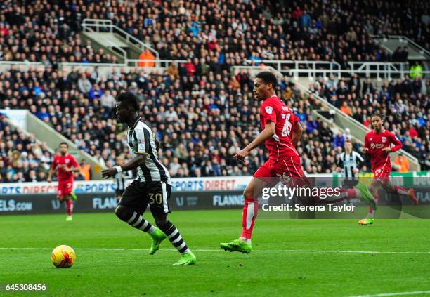 Christian Atsu of Newcastle United looks to pass the ball during the Sky Bet Championship Match between Newcastle United and Bristol City at...