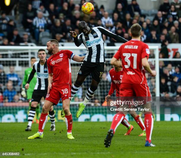 Mohamed Diame of Newcastle United jumps in the air to head the ball during the Sky Bet Championship Match between Newcastle United and Bristol City...