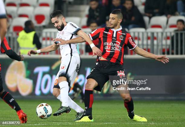 Younes Belhanda of Nice and Ryad Boudebouz of Montpellier in action during the French Ligue 1 match between OGC Nice and Monptellier Herault SC at...
