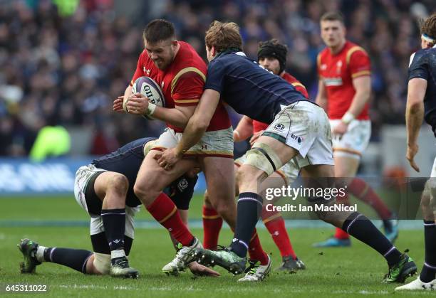 Rob Evans of Wales charges upfield during the RBS Six Nations match between Scotland and Wales at Murrayfield Stadium on February 25, 2017 in...