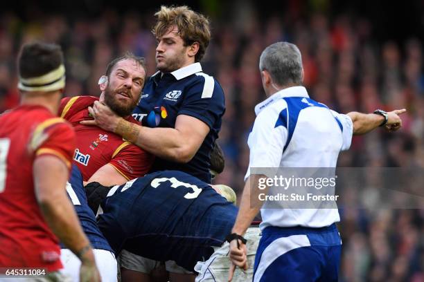 Alun Wyn Jones of Wales and Richie Gray of Scotland grapple during the RBS Six Nations match between Scotland and Wales at Murrayfield Stadium on...