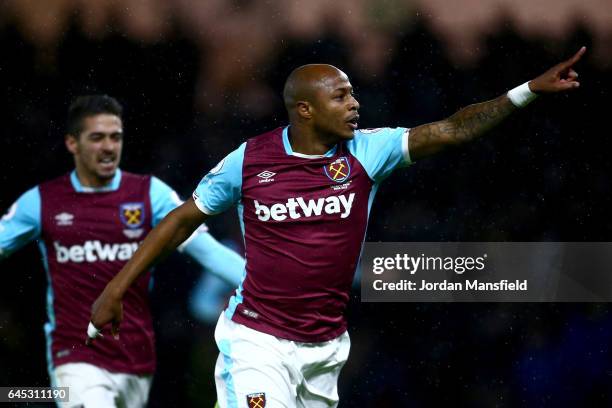 Andre Ayew of West Ham United celebrates after scoring his sides first goal during the Premier League match between Watford and West Ham United at...