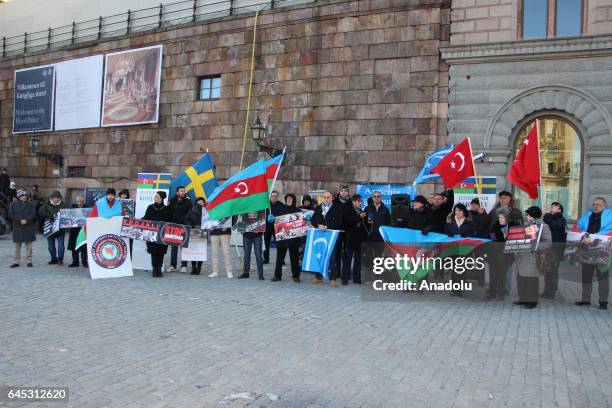 People attend a rally on the 25th anniversary of the Khojaly Massacre, in front the Parliament building in Stockholm, Sweden on February 25, 2017....