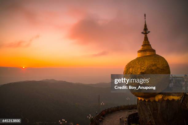 kyaiktiyo pagoda during the beautiful sunset of mon state in myanmar. - kyaiktiyo pagoda stock pictures, royalty-free photos & images