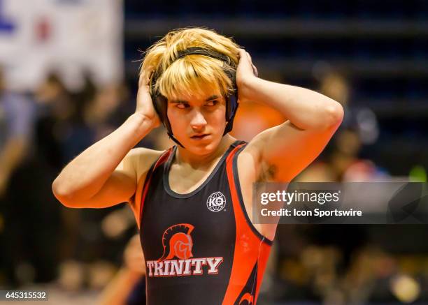 Trinity junior Mack Beggs got a nose plug after sustaining a nose bleed during the semi-finals match in the 6A Girls 110 Weight Class of the Texas...