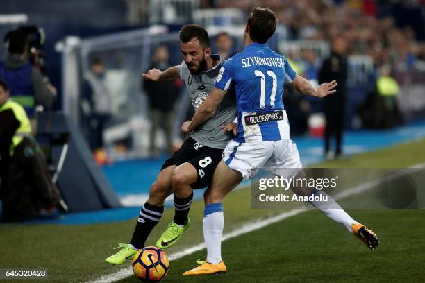 Emre Colak of Deportivo La Coruna in action against Alexander Szymanowski of Leganes during the La Liga football match between Leganes and Deportivo...