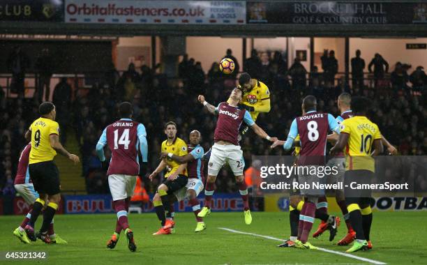 Watford's Miguel Angel Britos gets in a late header during the Premier League match between Watford and West Ham United at Vicarage Road on February...