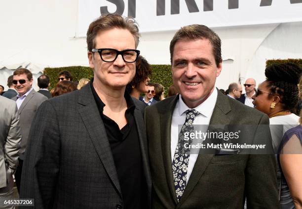Actor Colin Firth and President of Film Independent Josh Welsh attend the 2017 Film Independent Spirit Awards at the Santa Monica Pier on February...