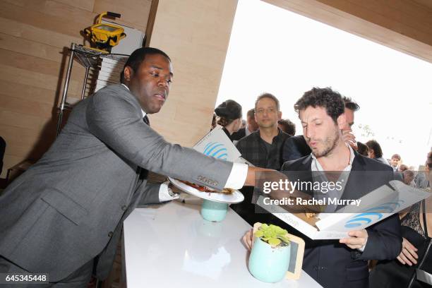 Actor Sam Richardson hands out pizza at AT&T's Jon & Vinny's pop-up pizza bar at the 2017 Film Independent Spirit Awards sponsored by AT&T at Santa...