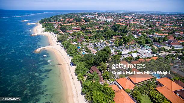 aerial views over sanur beach in bali. - sanur stock pictures, royalty-free photos & images