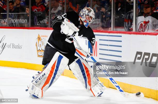 Jean-Francois Berube of the New York Islanders in action against the New Jersey Devils on February 19, 2017 at Barclays Center in the Brooklyn...