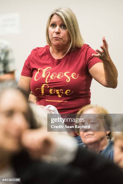 Woman voices her concerns during a town hall meeting with Sen. Tim Scott at the Charleston County Council Chambers on February 25, 2017 in North...