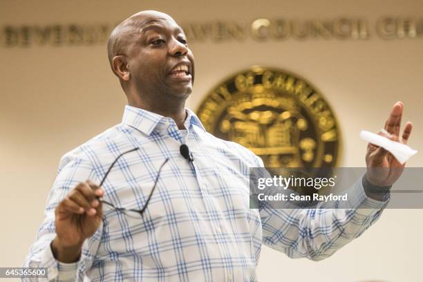 Sen. Tim Scott answers a question during a town hall meeting at the Charleston County Council Chambers on February 25, 2017 in North Charleston,...