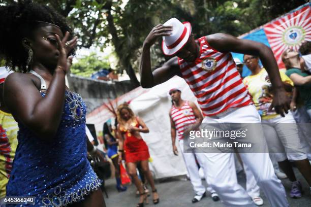 Revelers dance at the Amigos do Catete 'bloco', or street party, on the second official day of Carnival on February 25, 2017 in Rio de Janeiro,...