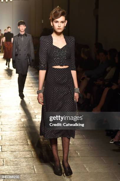 Model walks the runway at the Bottega Veneta Autumn Winter 2017 fashion show during Milan Fashion Week on February 25, 2017 in Milan, Italy.