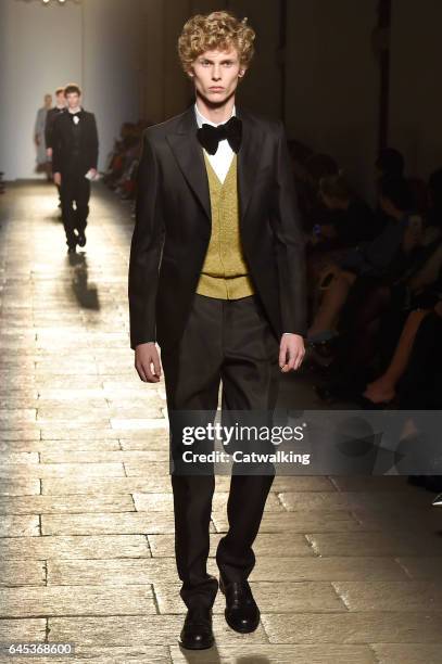 Model walks the runway at the Bottega Veneta Autumn Winter 2017 fashion show during Milan Fashion Week on February 25, 2017 in Milan, Italy.