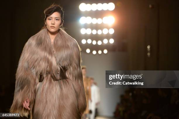 Model walks the runway at the Bottega Veneta Autumn Winter 2017 fashion show during Milan Fashion Week on February 25, 2017 in Milan, Italy.