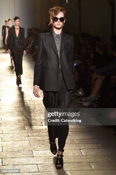 Model walks the runway at the Bottega Veneta Autumn Winter 2017 fashion show during Milan Fashion Week on February 25, 2017 in Milan, Italy.