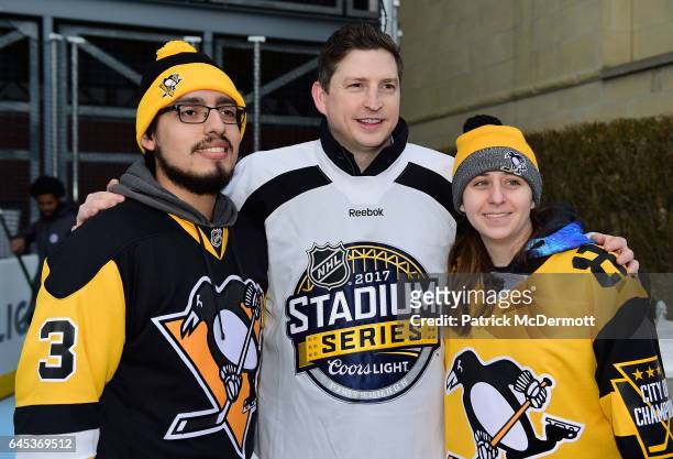 Pittsburgh Penguins alumni Colby Armstrong poses with hockey fans at The PreGame & NHL Centennial Fan Arena prior to the start of the 2017 Coors...