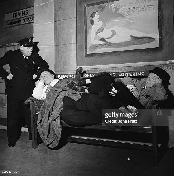 Comedy duo Stan Laurel and Oliver Hardy are found napping in front of a 'No Loitering' sign at a railway station in the sketch 'A Spot Of Trouble',...
