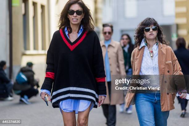 Viviana Volpicella wearing a black knut, button shirt dress, red heels outside Missoni during Milan Fashion Week Fall/Winter 2017/18 on February 25,...