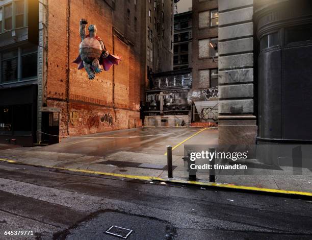 superhero tortoise taking off - new york street photos et images de collection