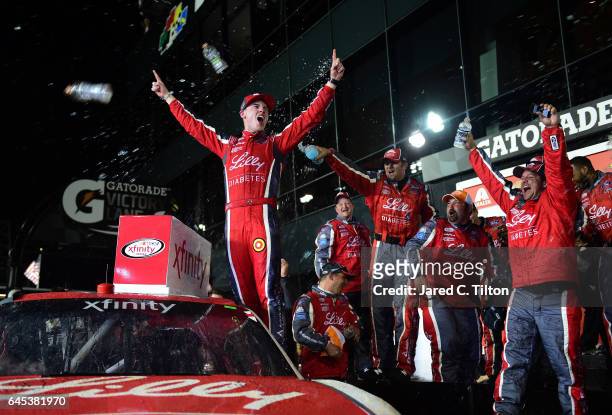 Ryan Reed, driver of the Lilly Diabetes Ford, celebrates in Victory Lane after winning the NASCAR XFINITY Series PowerShares QQQ 300 at Daytona...