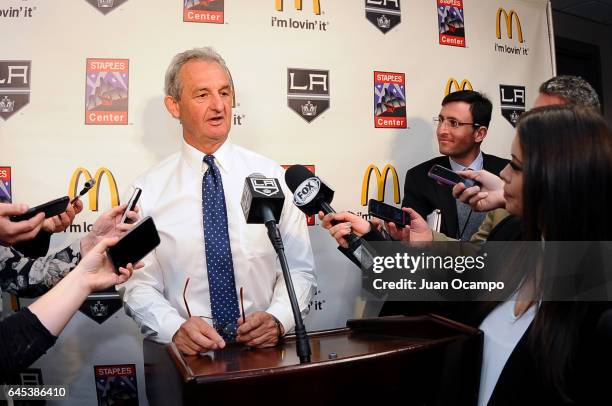 Head Coach Darryl Sutter of the Los Angeles Kings speaks to the media after the game against the Anaheim Ducks which made him the franchise leader in...