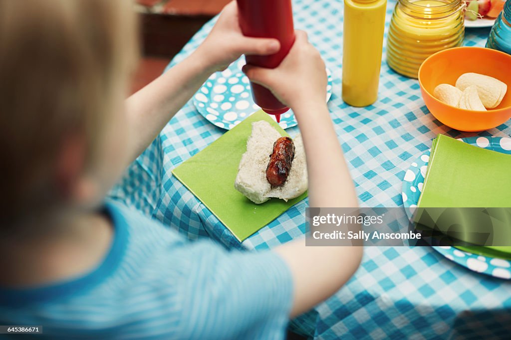 Child at a family barbecue