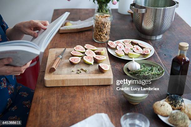 how to make a caramelized fig salad - cookbook stock pictures, royalty-free photos & images
