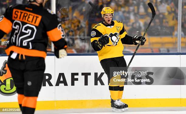 Sidney Crosby of the Pittsburgh Penguins celebrates his first period goal against the Philadelphia Flyers during the 2017 Coors Light NHL Stadium...