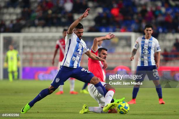 Franco Jara of Pachuca fights for the ball with Cristian Pellerano of Veracruz during a match between Pachuca and Veracruz as part of the the...