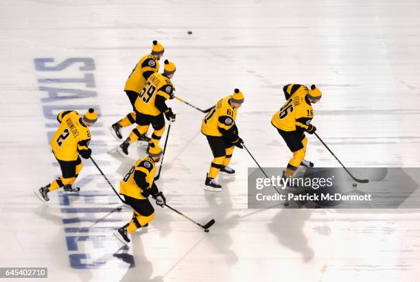The Pittsburgh Penguins skate during warm-up prior to the 2017 Coors Light NHL Stadium Series against the Philadelphia Flyers at Heinz Field on...