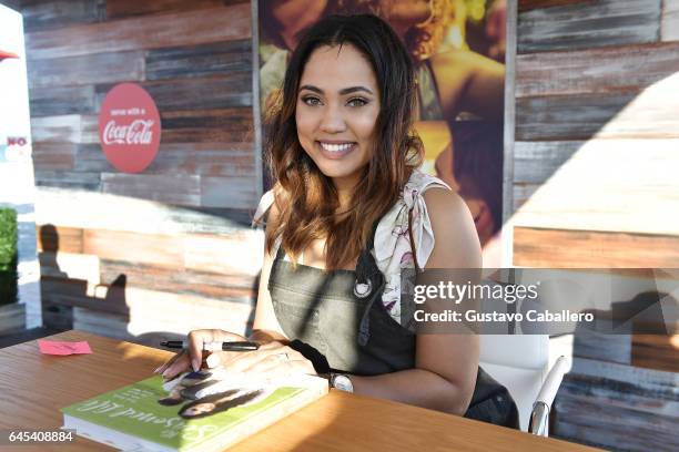 Ayesha Curry signs books at Goya Foods' Grand Tasting Village Featuring Mastercard Grand Tasting Tents & KitchenAid Culinary Demonstrations on...