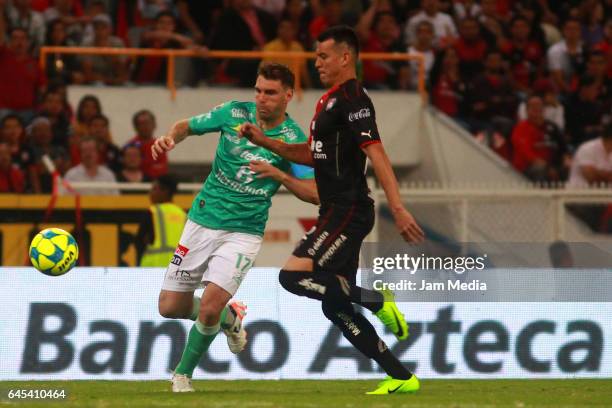 Mauro Boselli of Leon and Luis Reyes of Atlas fight for the ball during the 8th round match between Atlas and Leon as part of the Torneo Clausura...