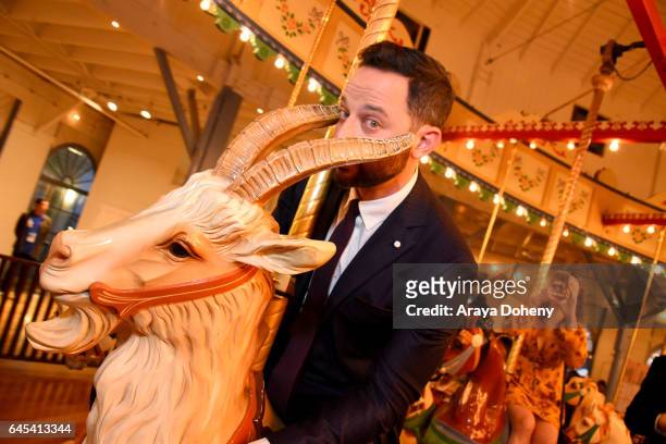 Nick Kroll rides the carousel at the 2017 Film Independent Spirit Awards at the Santa Monica Pier on February 25, 2017 in Santa Monica, California.