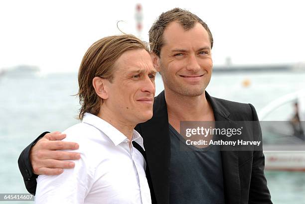 Jude Law and Jeremy Gilly attend the 'The Day After The Peace' Photocall at the Palais Des Festivals during the 61st International Cannes Film...