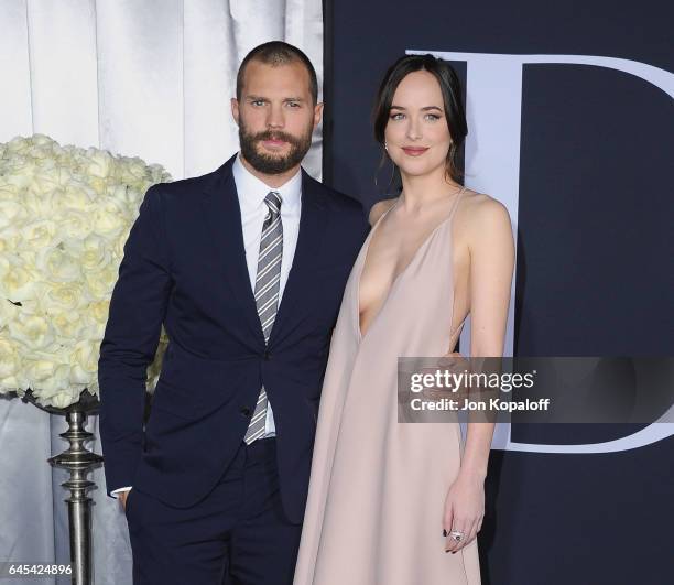 Actor Jamie Dornan and actress Dakota Johnson arrive at the Los Angeles premiere "Fifty Shades Darker" at The Theatre at Ace Hotel on February 2,...