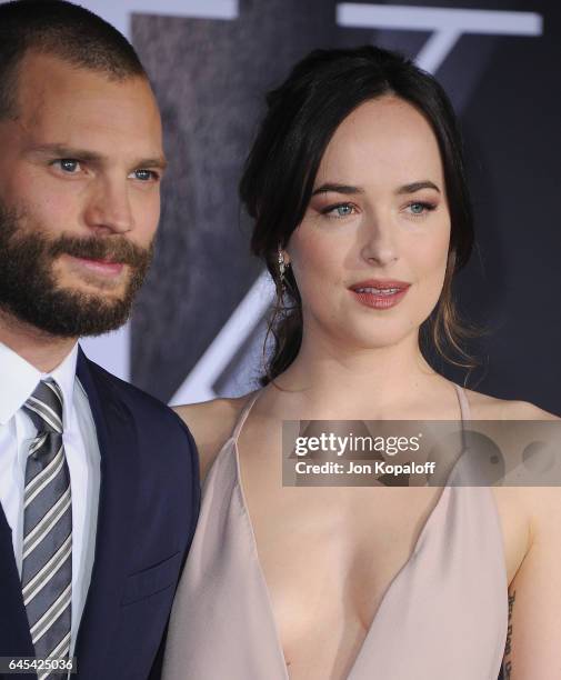 Actor Jamie Dornan and actress Dakota Johnson arrive at the Los Angeles premiere "Fifty Shades Darker" at The Theatre at Ace Hotel on February 2,...