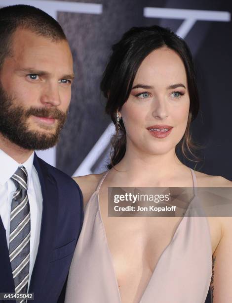 Actor Jamie Dornan and actress Dakota Johnson arrive at the Los Angeles premiere "Fifty Shades Darker" at The Theatre at Ace Hotel on February 2,...