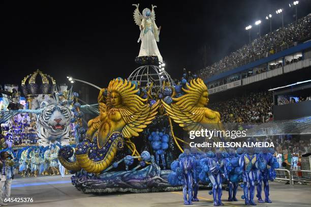 Revelers of the Imperio da Casa Verde samba school perform during the second night of carnival parade at the Sambadrome in Sao Paulo, Brazil early on...