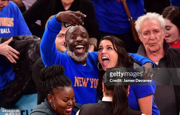 Michael K. Williams and Cecily Strong attend Philadelphia 76ers Vs. New York Knicks game at Madison Square Garden on February 25, 2017 in New York...
