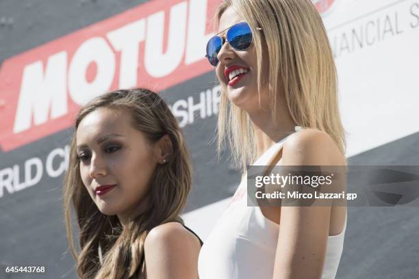 The grid girls smile on the podium at the end of the race 2 during round one of the FIM World Superbike Championship at Phillip Island Grand Prix...